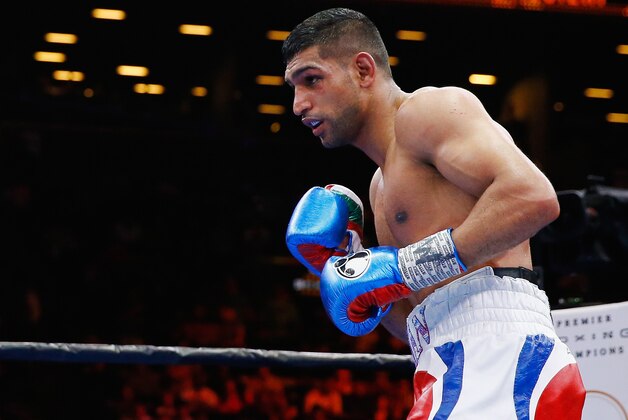NEW YORK, NY - MAY 29:  Amir Khan in action against Chris Algieri during their Welterweight bout at Barclays Center of Brooklyn on May 29, 2015 in New York City.  (Photo by Al Bello/Getty Images)