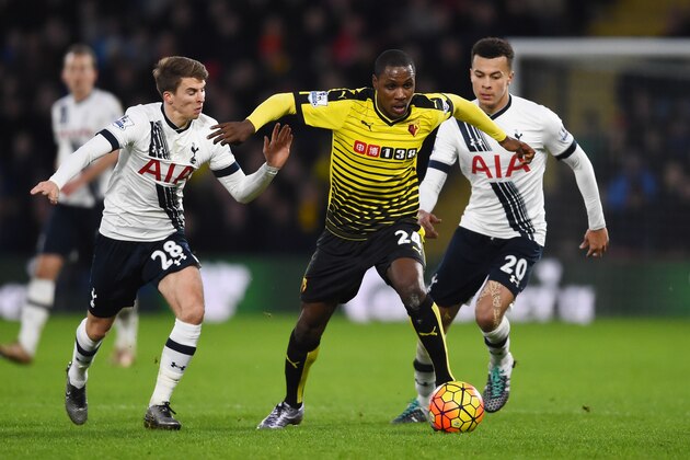 WATFORD, ENGLAND - DECEMBER 28:  Odion Ighalo of Watford evades Tommy Carroll and Dele Alli of Tottenham Hotspur during the Barclays Premier League match between Watford and Tottenham Hotspur at Vicarage Road on December 28, 2015 in Watford, England.  (Photo by Laurence Griffiths/Getty Images)