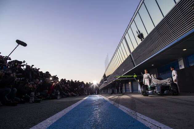 JEREZ DE LA FRONTERA, SPAIN - FEBRUARY 01:  Lewis Hamilton of Great Britain and Mercedes and Nico Rosberg of Germany and Mercedes during the Launch of The Mercedes W06 Hybrid during day one of Formula One Winter Testing at Circuito de Jerez on February 1, 2015 in Jerez de la Frontera, Spain.  (Photo by Peter J Fox/Getty Images)