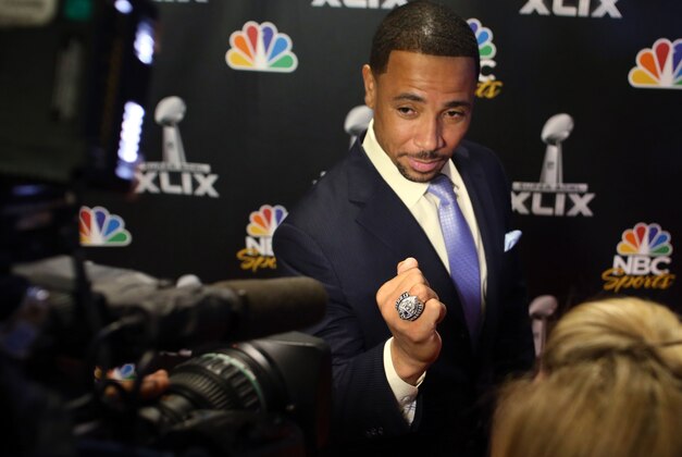 Jan 27, 2015; Phoenix, AZ, USA; NBC Sports analyst Rodney Harrison shows reporters his Super Bowl ring during the NBC Sports Group Press Conference at Media Center-Press Conference Room B. Mandatory Credit: Peter Casey-USA TODAY Sports