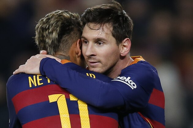 FC Barcelona's Lionel Messi, right, celebrates with his teammate Neymar after scoring against Valencia during a semifinal, first leg, Copa del Rey soccer match at the Camp Nou stadium in Barcelona, Spain, Wednesday, Feb. 3, 2016. (AP Photo/Manu Fernandez)
