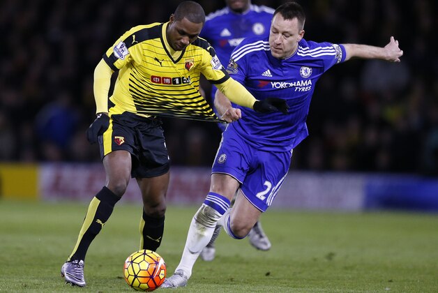 Watford’s Odion Ighalo, left, and Chelsea's John Terry challenge for the ball during the English Premier League soccer match between Watford and Chelsea at the Vicarage Road stadium in London, Wednesday, Feb. 3, 2016.(AP Photo/Frank Augstein)