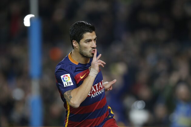 FC Barcelona's Luis Suarez reacts after scoring against Valencia during a semifinal, first leg, Copa del Rey soccer match at the Camp Nou stadium in Barcelona, Spain, Wednesday, Feb. 3, 2016. (AP Photo/Manu Fernandez)