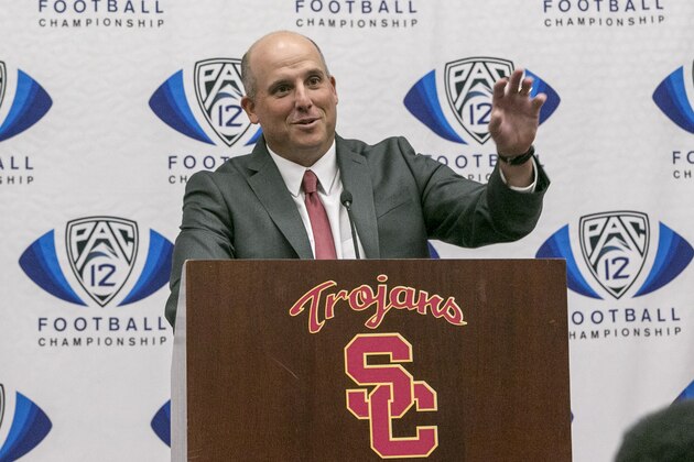 Southern California new coach Clay Helton takes questions from members of the media in Los Angeles, Monday, Nov. 30, 2015. USC hired Helton as its permanent coach on Monday, removing the interim tag five days before the Trojans face Stanford in the Pac-12 championship game. (AP Photo/Damian Dovarganes)