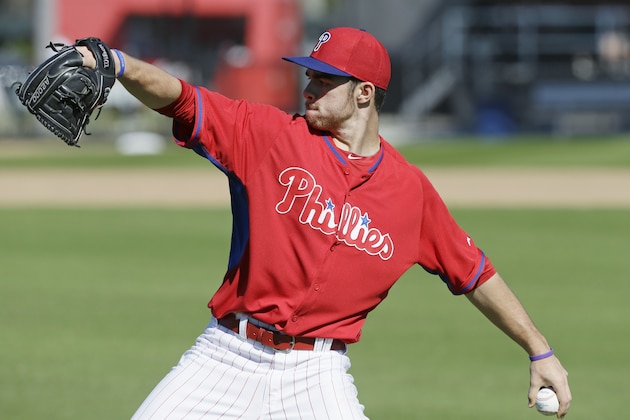 Philadelphia Phillies pitcher Jesse Biddle throws during spring training baseball practice Sunday, Feb. 16, 2014, in Clearwater, Fla. (AP Photo/Charlie Neibergall)