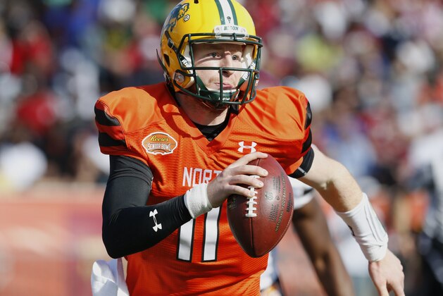 North squad quarterback Carson Wentz of North Dakota State (11) runs the ball during the Senior Bowl NCAA college football game, Saturday, Jan. 30, 2016, at Ladd–Peebles Stadium, in Mobile, Ala. (AP Photo/Brynn Anderson)