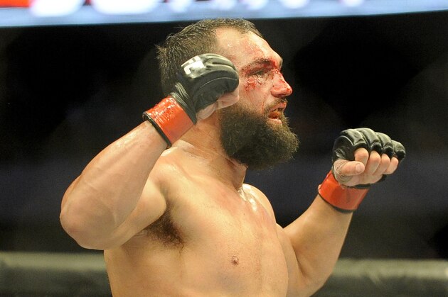 Johny Hendricks walks to his corner after the 5th round during a UFC 171 mixed martial arts welterweight title bout, Saturday, March 15, 2014, in Dallas. Hendricks won by decision. (AP Photo/Matt Strasen)