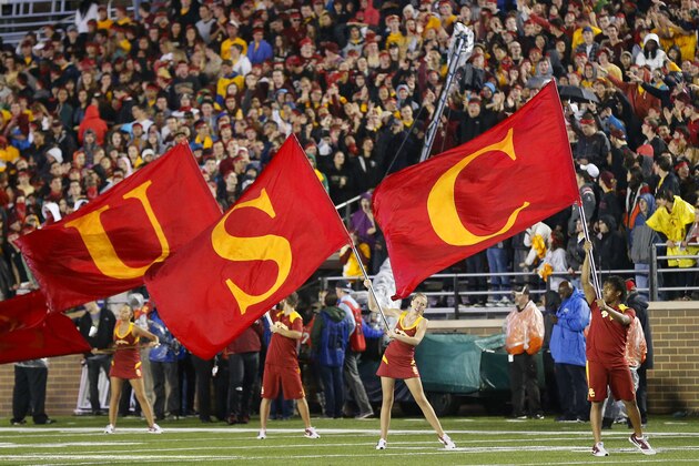 CHESTNUT HILL, MA - SEPTEMBER 13:  The USC cheerleaders wave flags before the game between the Boston College Eagles and the USC Trojans on September 13, 2014 at Alumni Stadium in Chestnut Hill, Massachusetts.  (Photo by Winslow Townson/Getty Images)