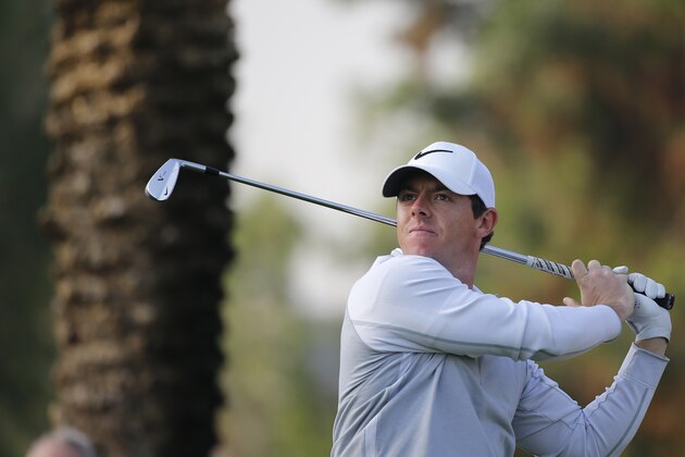 Rory McIlroy of Northern Ireland plays his third shot during the first round of the 2016  Dubai Desert Classic at the Emirates Golf Club on February 4, 2016 in Dubai. / AFP / KARIM SAHIB        (Photo credit should read KARIM SAHIB/AFP/Getty Images)
