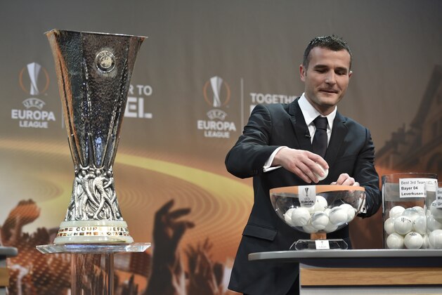 UEFA Europa League final ambassador  Alexander Frei takes part in the draw for  the UEFA Europa league round of sixteen, on December 14, 2015 at the European football organization's headquarters in Nyon.  AFP PHOTO / FABRICE COFFRINI / AFP / FABRICE COFFRINI        (Photo credit should read FABRICE COFFRINI/AFP/Getty Images)