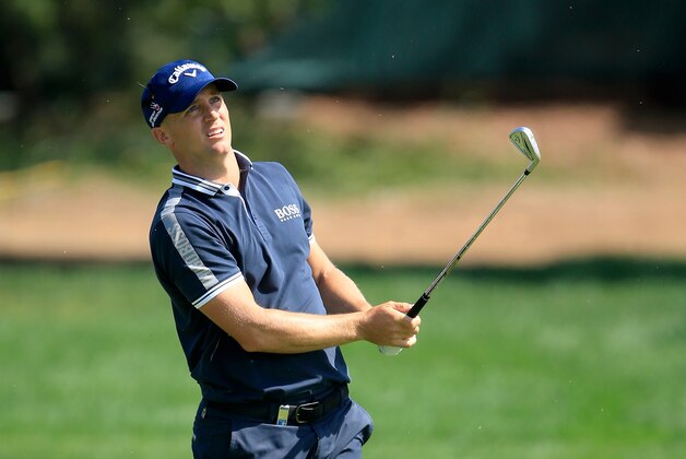 DUBAI, UNITED ARAB EMIRATES - FEBRUARY 04:  Alex Noren of Sweden plays his second shot on the par 4, ninth hole during the first round of the 2016 Omega Dubai Desert Classic on the Majlis Course at the Emirates Golf Club on February 4, 2016 in Dubai, United Arab Emirates.  (Photo by David Cannon/Getty Images)
