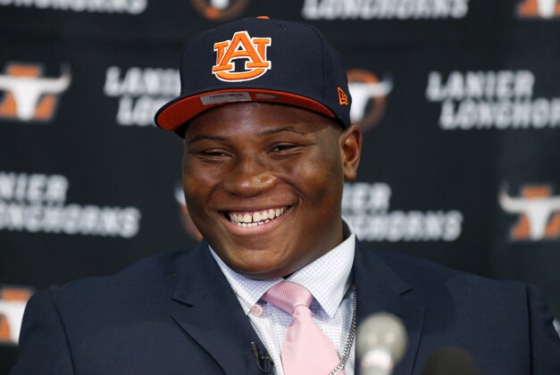 Feb 3, 2016; Buford, GA, USA; Lanier High School defensive tackle Derrick Brown commits to the Auburn Tigers at Auburn University during national signing day at Lanier High School. Mandatory Credit: Jason Getz-USA TODAY Sports