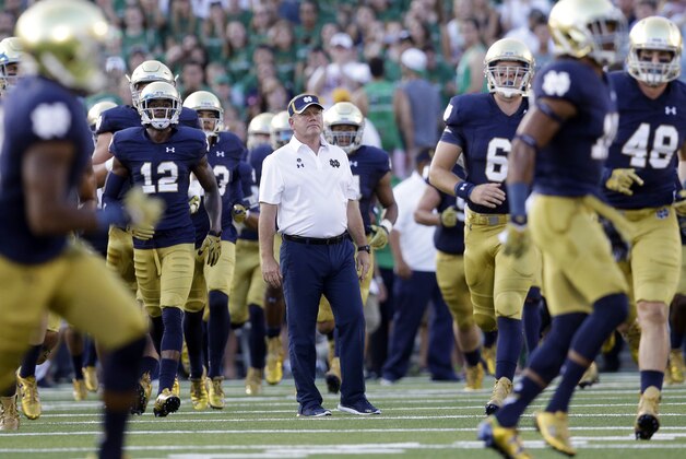Notre Dame head coach Brian Kelly watches his team an NCAA college football game against Texas, Saturday, Sept. 5, 2015, in South Bend, Ind. (AP Photo/Nam Y. Huh)