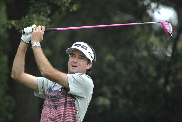 Bubba Watson reacts after his second attempt at a tee shot on the third hole during the second round of the Tour Championship golf tournament at East Lake Club Friday, Sept. 25, 2015, in Atlanta. (AP Photo/John Amis)