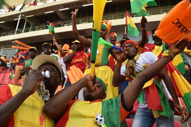 Mali's national football team supporters cheer during the 2015 African Cup of Nations group D football match between Mali and Cameroon in Malabo on January 20, 2015. AFP PHOTO / ISSOUF SANOGO        (Photo credit should read ISSOUF SANOGO/AFP/Getty Images)