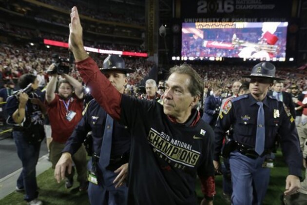 Alabama head coach Nick Saban waves to fans after the NCAA college football playoff championship game against Clemson Monday, Jan. 11, 2016, in Glendale, Ariz. Alabama won 45-40. (AP Photo/Chris Carlson)