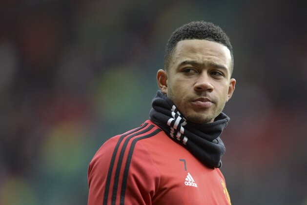 Manchester United's Dutch midfielder Memphis Depay warms up before the English Premier League football match between Manchester United and Southampton at Old Trafford in Manchester, north west England, on January 23, 2016. AFP PHOTO / OLI SCARFF

 / AFP / OLI SCARFF        (Photo credit should read OLI SCARFF/AFP/Getty Images)