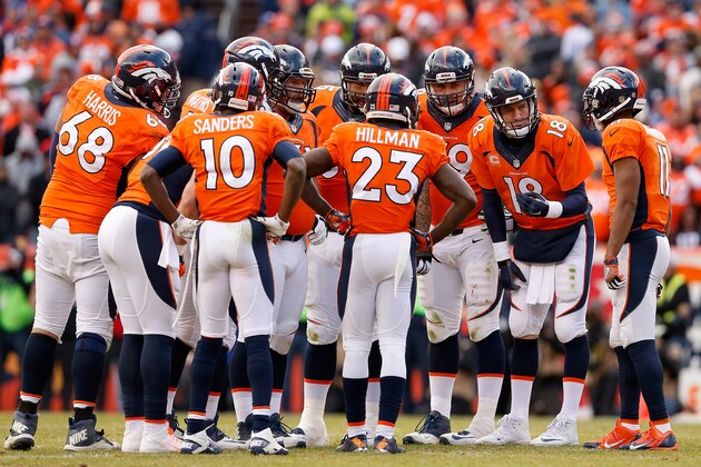 DENVER, CO - JANUARY 24:  Quarterback Peyton Manning #18 of the Denver Broncos talks with his team in the huddle during the AFC Championship game New England Patriots aat Sports Authority Field at Mile High on January 24, 2016 in Denver, Colorado. The Broncos defeated the Patriots 20-18.  (Photo by Christian Petersen/Getty Images)