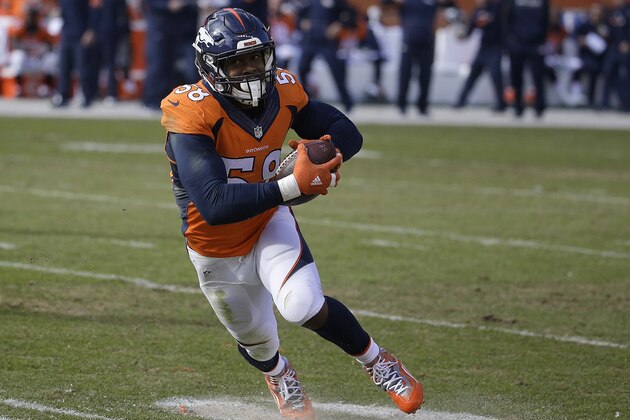 Denver Broncos outside linebacker Von Miller (58) intercepts a pass from New England Patriots quarterback Tom Brady during the first half the NFL football AFC Championship game between the Denver Broncos and the New England Patriots, Sunday, Jan. 24, 2016, in Denver. (AP Photo/Chris Carlson)