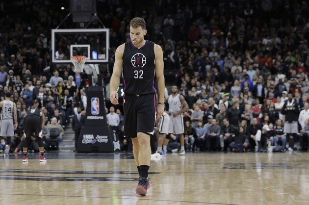 Los Angeles Clippers forward Blake Griffin walks up court during the final seconds of the team's 115-107 loss to San Antonio Spurs in an NBA basketball game, Friday, Dec. 18, 2015, in San Antonio. (AP Photo/Eric Gay)