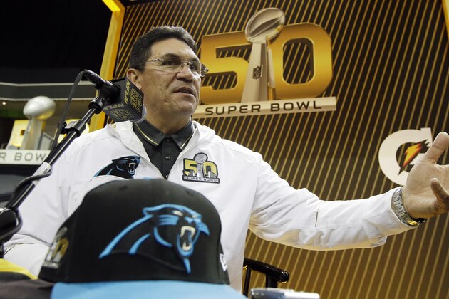 Carolina Panthers head coach Ron Rivera answers a question during Opening Night for the NFL Super Bowl 50 football game Monday, Feb. 1, 2016, in San Jose, Calif. (AP Photo/Jeff Chiu)