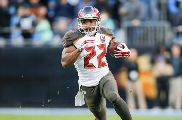 Tampa Bay Buccaneers running back Doug Martin (22) runs the ball against the Carolina Panthers during an NFL game in Charlotte, N.C. on Sunday, Jan. 3, 2016. (Chris Keane/AP Images for Panini)