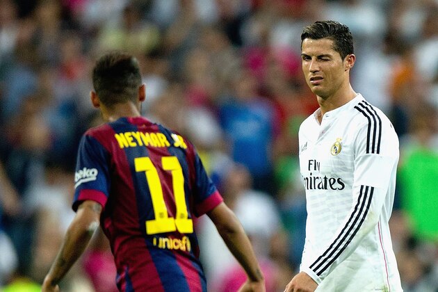 MADRID, SPAIN - OCTOBER 25: Cristiano Ronaldo of Real Madrid CF winks at Neymar of Barcelona  during the La Liga match between Real Madrid CF and FC Barcelona at Estadio Santiago Bernabeu on October 25, 2014 in Madrid, Spain.  (Photo by Gonzalo Arroyo Moreno/Getty Images)
