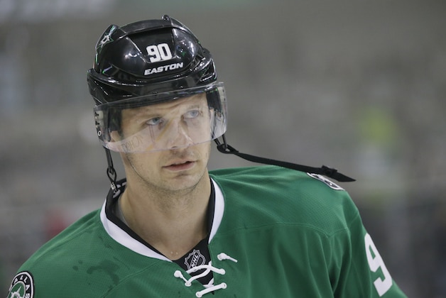 Dallas Stars center Jason Spezza (90) warms up before an NHL hockey game  against the Ottawa Senators Tuesday, Nov. 24, 2015, in Dallas. (AP Photo/LM Otero)