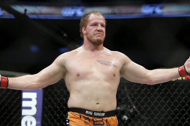 Jared Rosholt celebrates a TKO win in three rounds over Josh Copeland during a men's heavyweight UFC bout, Saturday, March 14, 2015, in Dallas. (AP Photo/Brandon Wade)
