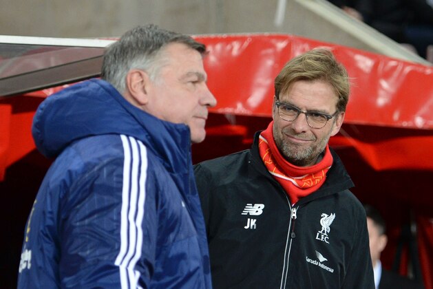 Liverpool's German manager Jurgen Klopp (R) and Sunderland's English manager Sam Allardyce (L) take their places for the English Premier League football match between Sunderland and Liverpool at the Stadium of Light in Sunderland, north east England, on December 30, 2015. AFP PHOTO / OLI SCARFF

RESTRICTED TO EDITORIAL USE. No use with unauthorized audio, video, data, fixture lists, club/league logos or 'live' services. Online in-match use limited to 75 images, no video emulation. No use in betting, games or single club/league/player publications. / AFP / OLI SCARFF        (Photo credit should read OLI SCARFF/AFP/Getty Images)