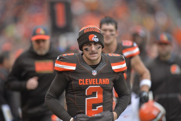 Cleveland Browns quarterback Johnny Manziel walks off the field at halftime of an NFL football game against the Cincinnati Bengals Sunday, Dec. 6, 2015, in Cleveland. Cincinnati won 37-3. (AP Photo/David Richard)