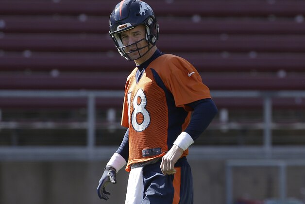 Denver Broncos quarterback Peyton Manning (18) stands on the field during an NFL football practice in Stanford, Calif., Thursday, Feb. 4, 2016. (AP Photo/Jeff Chiu)