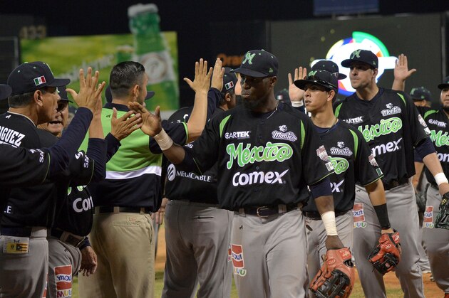 Mexico players celebrate after defeating Puerto Rico in their 2016 Caribbean baseball series game on February 5, 2016 in Santo Domingo. AFP PHOTO/YAMIL LAGE / AFP / YAMIL LAGE        (Photo credit should read YAMIL LAGE/AFP/Getty Images)