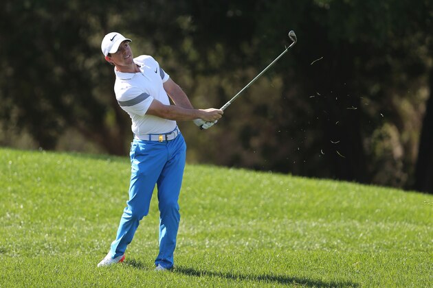 Rory McIlroy of Northern Ireland plays a shot on the 2nd hole  during 3rd round of the Dubai Desert Classic golf tournament in Dubai, United Arab Emirates, Saturday, Feb. 6, 2016. (AP Photo/Kamran Jebreili)