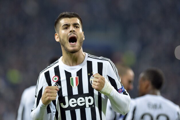 Juventus Alvaro Morata celebrates after he scored during the Champions League group D soccer match between Juventus and FC Sevilla, at the Juventus Stadium in Turin, Italy, Wednesday, Sept. 30, 2015. (AP Photo/Massimo Pinca)