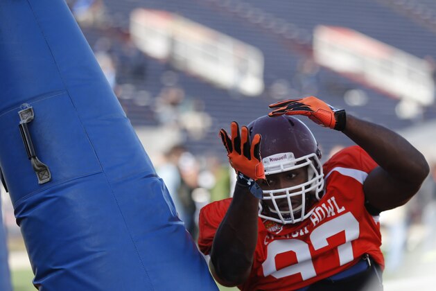 Eastern Kentucky defensive end Noah Spence runs through drills during NCAA college football practice for the Senior Bowl, Thursday, Jan. 28, 2016, at Ladd–Peebles Stadium, in Mobile, Ala. (AP Photo/Brynn Anderson)
