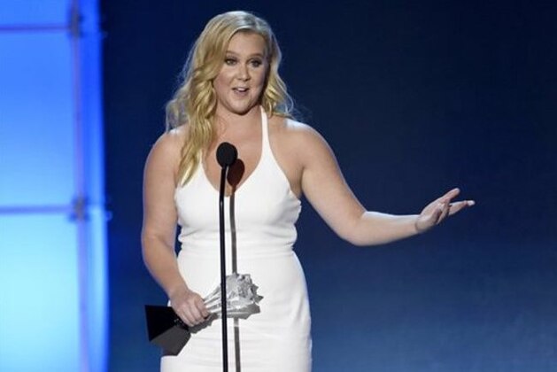 Amy Schumer accepts the Critics’ Choice MVP award at the 21st annual Critics' Choice Awards at the Barker Hangar on Sunday, Jan. 17, 2016, in Santa Monica, Calif. (Photo by Chris Pizzello/Invision/AP)