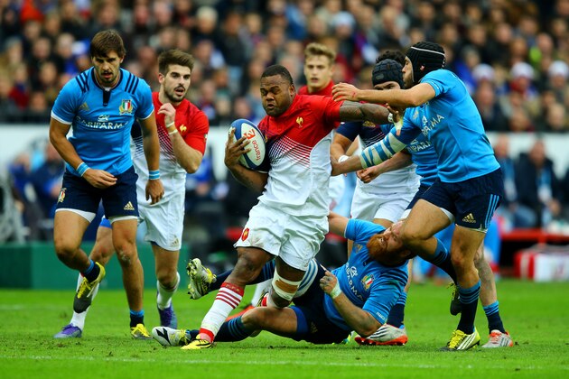 PARIS, FRANCE - FEBRUARY 06:  Virimi Vakatawa of France breaks free from a tackle by Gonzalo Garcia of Italy during the RBS Six Nations match between France and Italy at Stade de France on February 6, 2016 in Paris, France.  (Photo by Richard Heathcote/Getty Images)