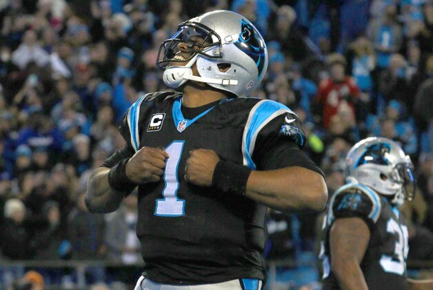 Carolina Panthers quarterback Cam Newton (1) celebrates his touchdown run against the Tampa Bay Buccaneers in the second half of an NFL football game in Charlotte, N.C., Sunday, Jan. 3, 2016. (AP Photo/Bob Leverone)
