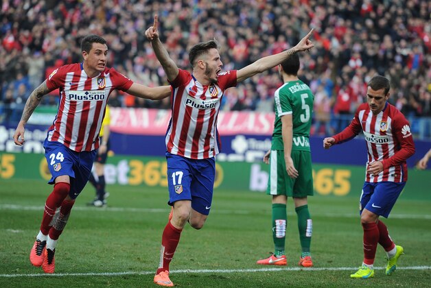 MADRID, SPAIN - FEBRUARY 06:  Saul Niguez (R) of Club Atletico de Madrid celebrates with  Jose Maria Gimenez after scoring his team's 2nd goal during the La Liga match between Club Atletico de Madrid and SD Eibar at Vicente Calderon Stadium on February 6, 2016 in Madrid, Spain.  (Photo by Denis Doyle/Getty Images)