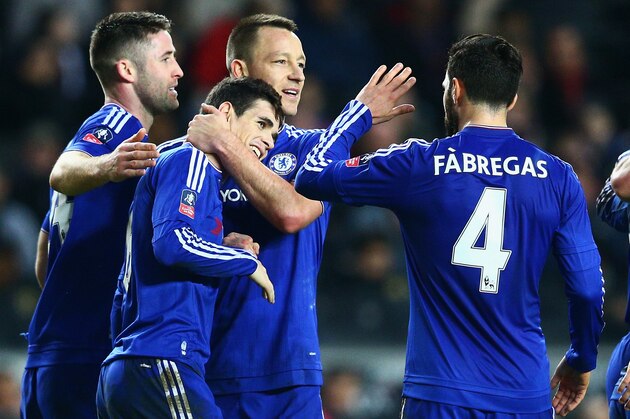 MILTON KEYNES, ENGLAND - JANUARY 31:  Oscar of Chelsea celebrates scoring his hat trick goal with John Terry during the Emirates FA Cup Fourth Round match between Milton Keynes Dons and Chelsea at Stadium mk on January 31, 2016 in Milton Keynes, England.  (Photo by Clive Mason/Getty Images)