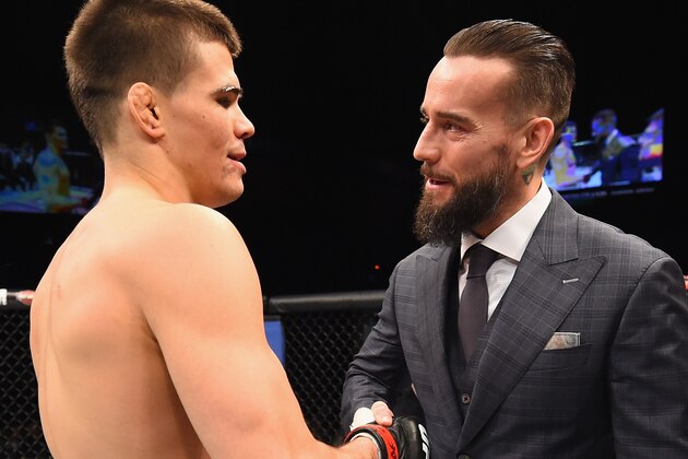 LAS VEGAS, NV - FEBRUARY 06:  (R-L) Phil 'CM Punk' Brooks congratulates Mickey Gall after Gall's victory over Mike Jackson during the UFC Fight Night event at MGM Grand Garden Arena on February 6, 2016 in Las Vegas, Nevada.  (Photo by Jeff Bottari/Zuffa LLC/Zuffa LLC via Getty Images)