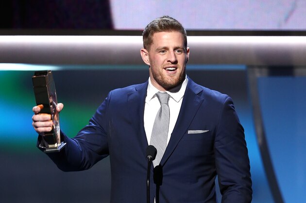 J.J. Watt of the Houston Texans accepts the AP defensive player of the year award at the 5th annual NFL Honors at the Bill Graham Civic Auditorium on Saturday, Feb. 6, 2016, in San Francisco. (Photo by John Salangsang/Invision for NFL/AP Images)