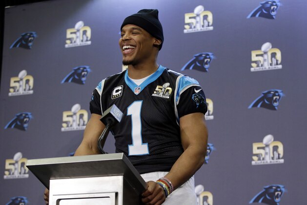 Carolina Panthers quarterback Cam Newton smiles as he fields questions during a press conference in preparation for the Super Bowl 50 football game Thursday Feb. 4, 2016 in San Jose, Calif. (AP Photo/Marcio Jose Sanchez)
