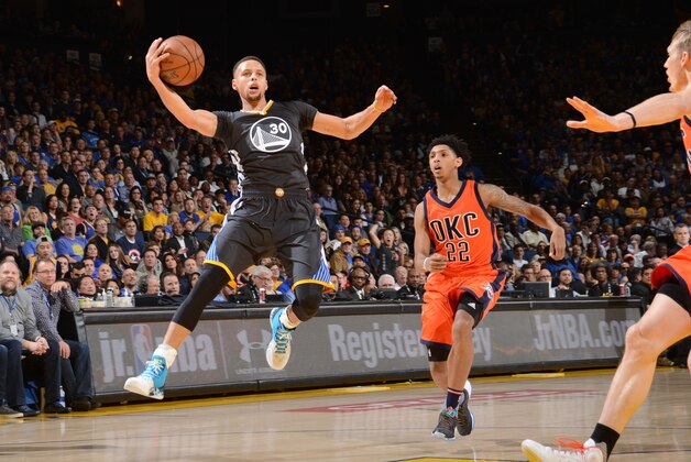 OAKLAND, CA - FEBRUARY 6: Stephen Curry #30 of the Golden State Warriors grabs the rebound against the Oklahoma City Thunder during the game on February 6, 2016 at ORACLE Arena in Oakland, California. NOTE TO USER: User expressly acknowledges and agrees that, by downloading and or using this Photograph, user is consenting to the terms and conditions of the Getty Images License Agreement. Mandatory Copyright Notice: Copyright 2016 NBAE (Photo by Noah Graham/NBAE via Getty Images)