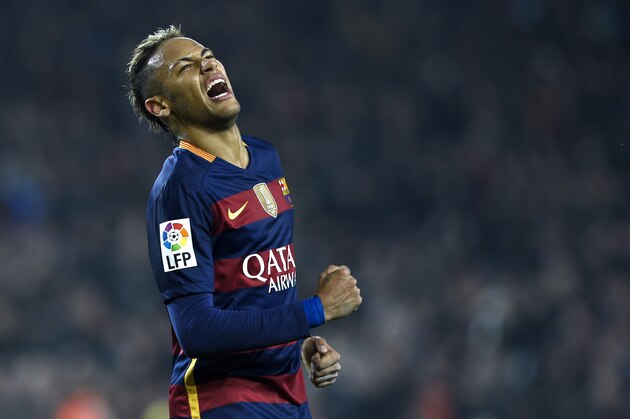 Barcelona's Brazilian forward Neymar celebrates after scoring a goal during the Spanish Copa del Rey (King's Cup) quarter-finals second leg football match FC Barcelona vs Athletic Club de Bilbao at Camp Nou stadium in Barcelona on January 27, 2016.   AFP PHOTO / LLUIS GENE / AFP / LLUIS GENE        (Photo credit should read LLUIS GENE/AFP/Getty Images)