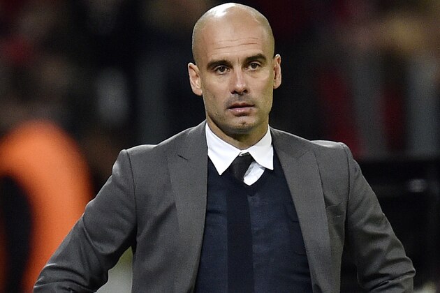 Bayern's head coach Pep Guardiola watches from his zone during the German Bundesliga soccer match between Bayer Leverkusen and Bayern Munich in Leverkusen, Germany, Saturday, Feb. 6, 2016. (AP Photo/Martin Meissner)