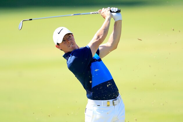 DUBAI, UNITED ARAB EMIRATES - FEBRUARY 07:  Rory McIlroy of Northern Ireland plays his second shot at the par 4, first hole during the final round of the 2016 Omega Dubai Desert Classic on the Majlis Course at the Emirates Golf Club on February 7, 2016 in Dubai, United Arab Emirates.  (Photo by David Cannon/Getty Images)