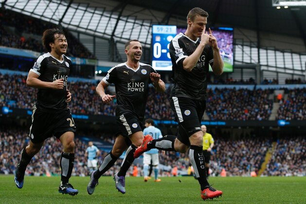 Leicester City's German defender Robert Huth (R) celebrates after scoring his second goal during the English Premier League football match between Manchester City and Leicester City at the Etihad Stadium in Manchester, north west England, on February 6, 2016.  / AFP / ADRIAN DENNIS / RESTRICTED TO EDITORIAL USE. No use with unauthorized audio, video, data, fixture lists, club/league logos or 'live' services. Online in-match use limited to 75 images, no video emulation. No use in betting, games or single club/league/player publications.  /         (Photo credit should read ADRIAN DENNIS/AFP/Getty Images)