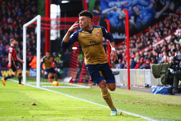 BOURNEMOUTH, ENGLAND - FEBRUARY 07:  Alex Oxlade-Chamberlain of Arsenal celebrates as he scores their second goal during the Barclays Premier League match between A.F.C. Bournemouth and Arsenal at the Vitality Stadium on February 7, 2016 in Bournemouth, England.  (Photo by Matthew Lewis/Getty Images)